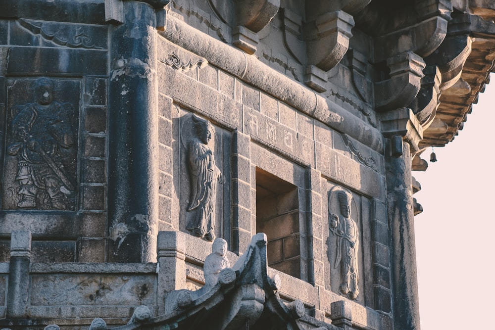 a building with a statue on the side