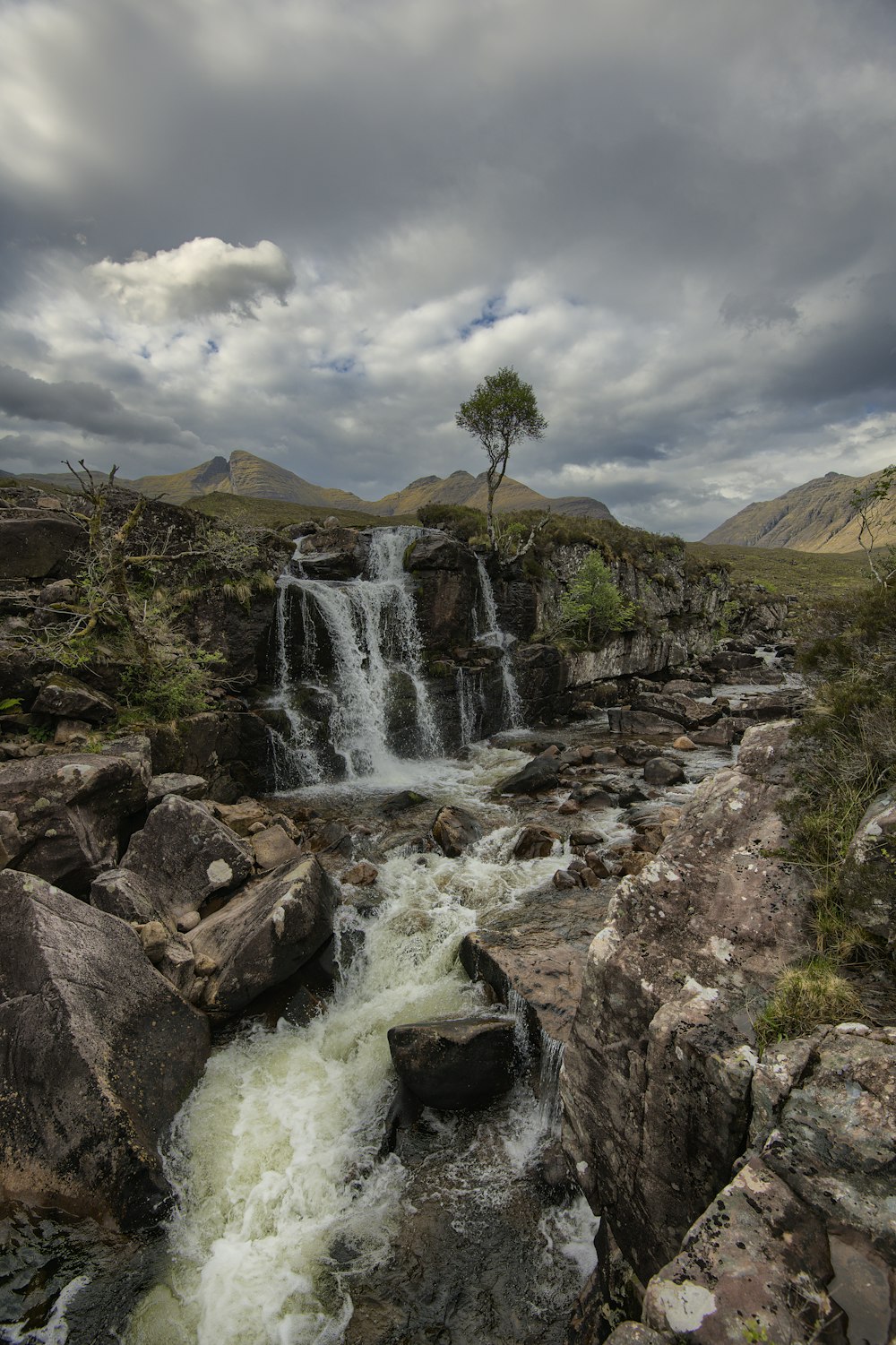 a waterfall in a rocky area