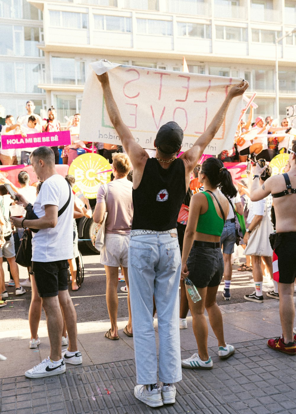 a group of people holding up a sign