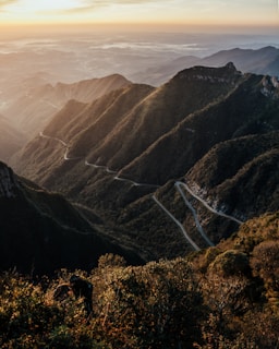 a waterfall in a valley