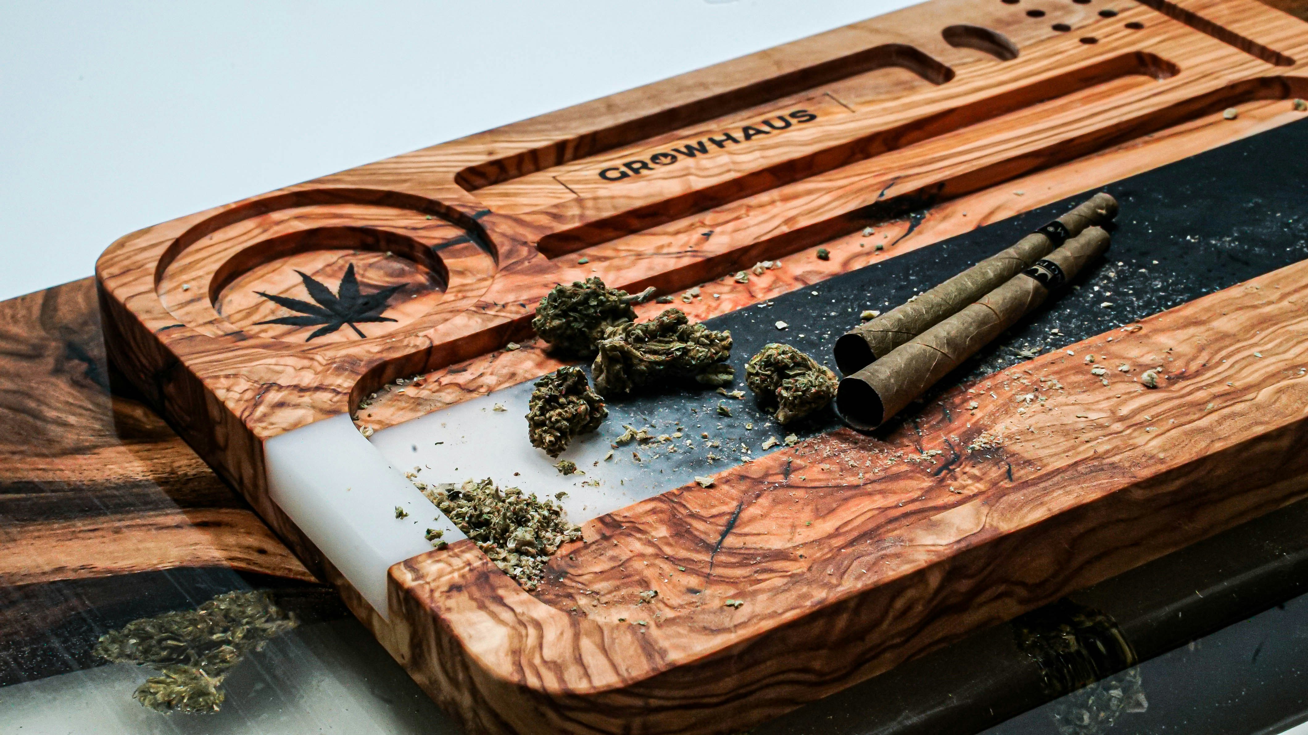 a wooden boat with a group of small insects on it