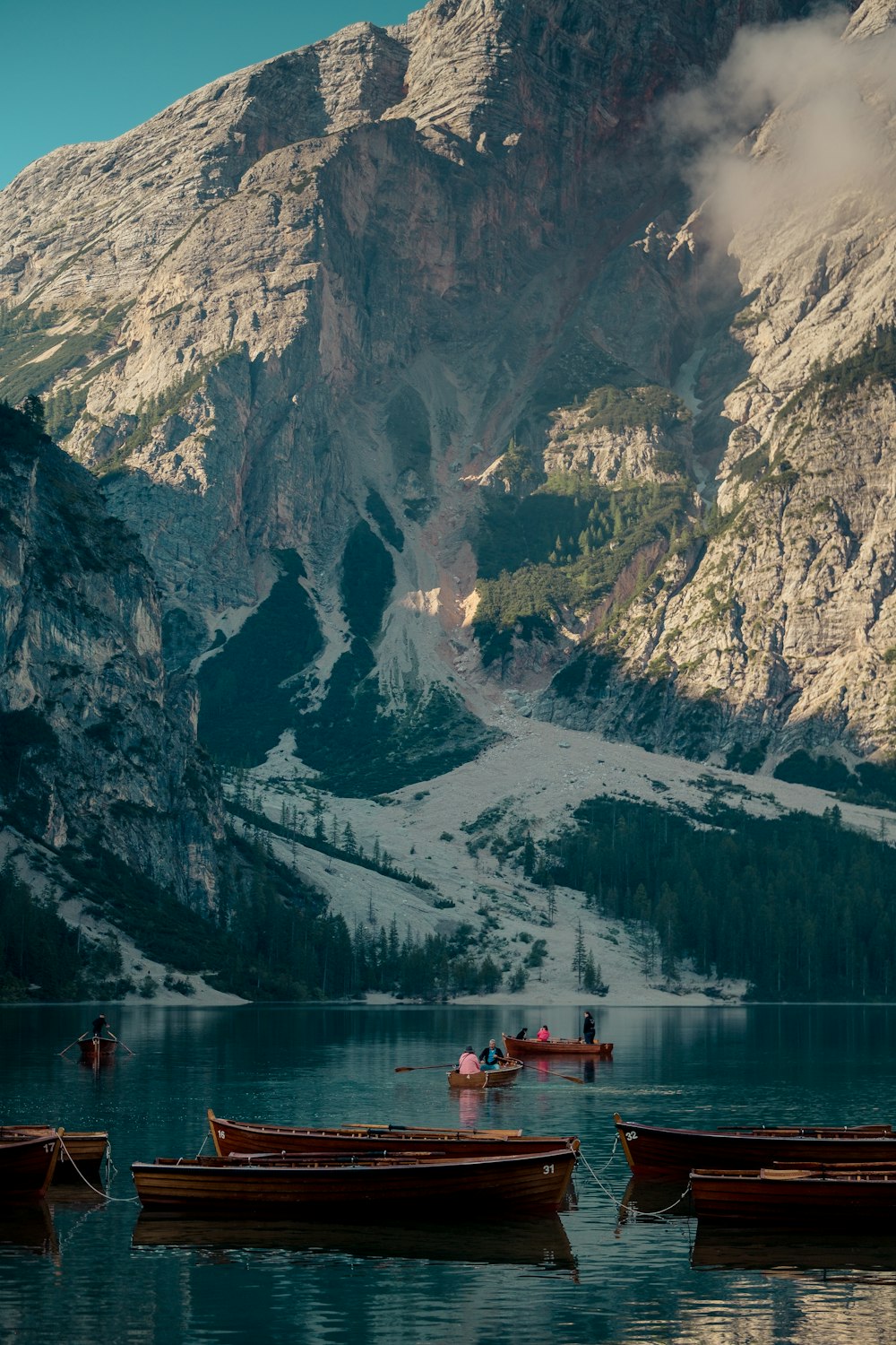 a group of boats in a lake