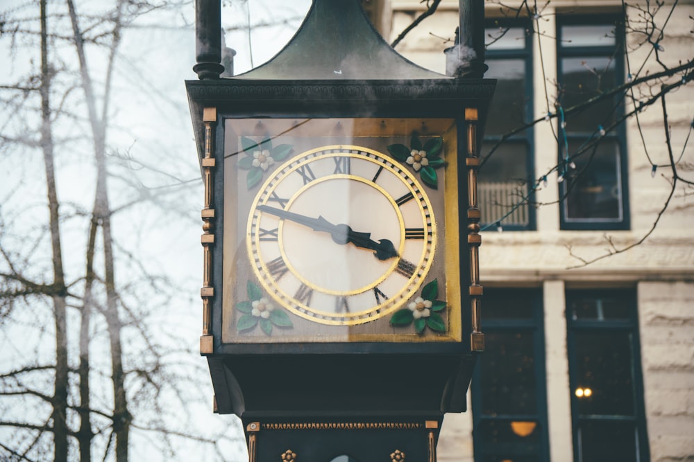 a clock on a pole