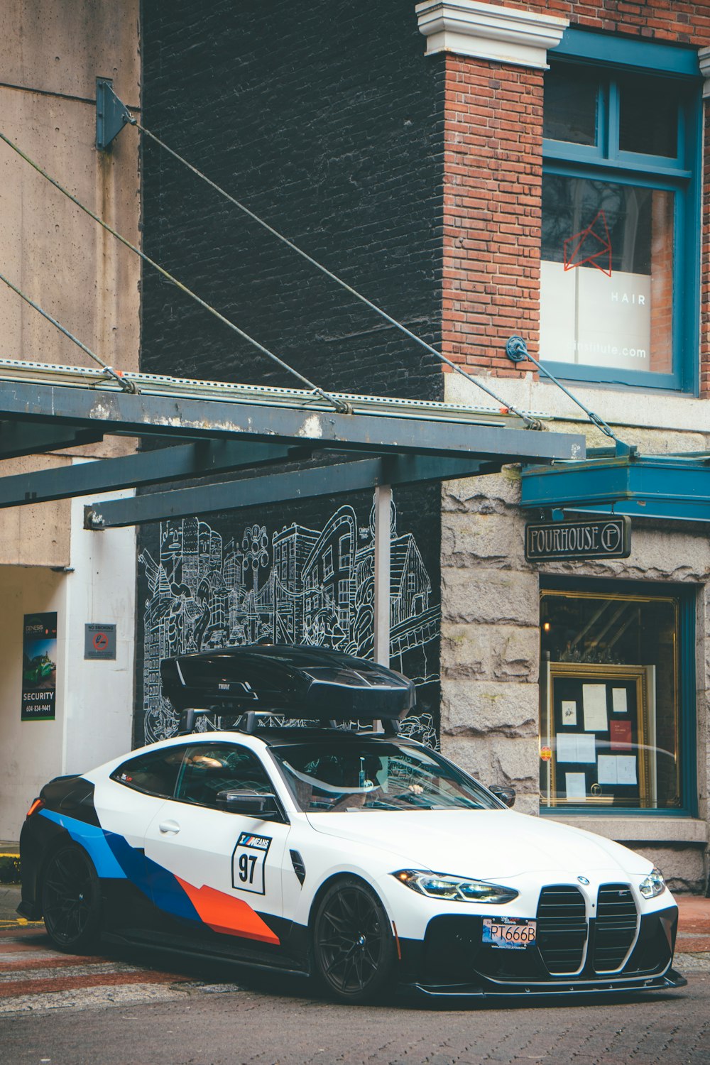 a police car parked outside a building