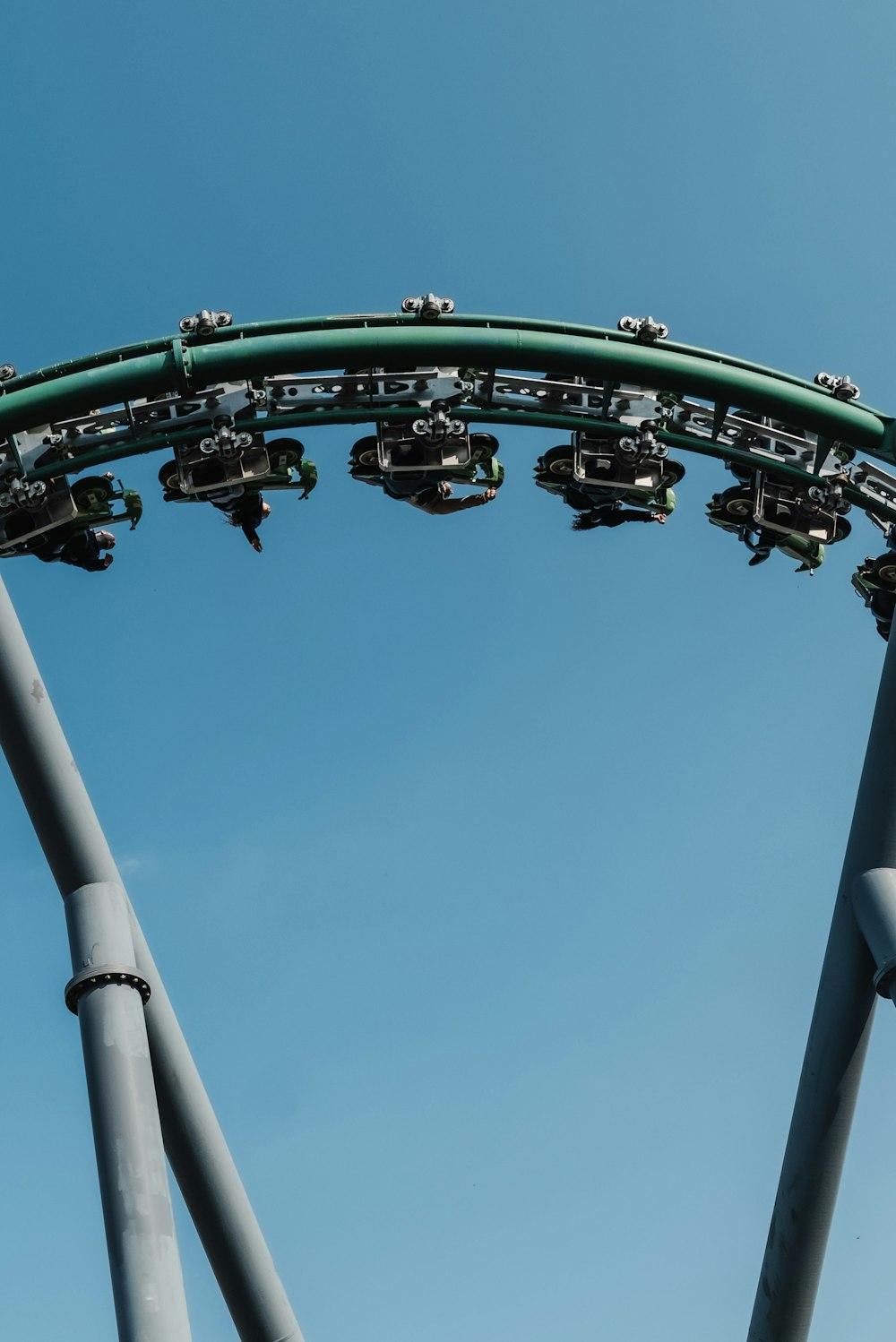 a roller coaster with a blue sky