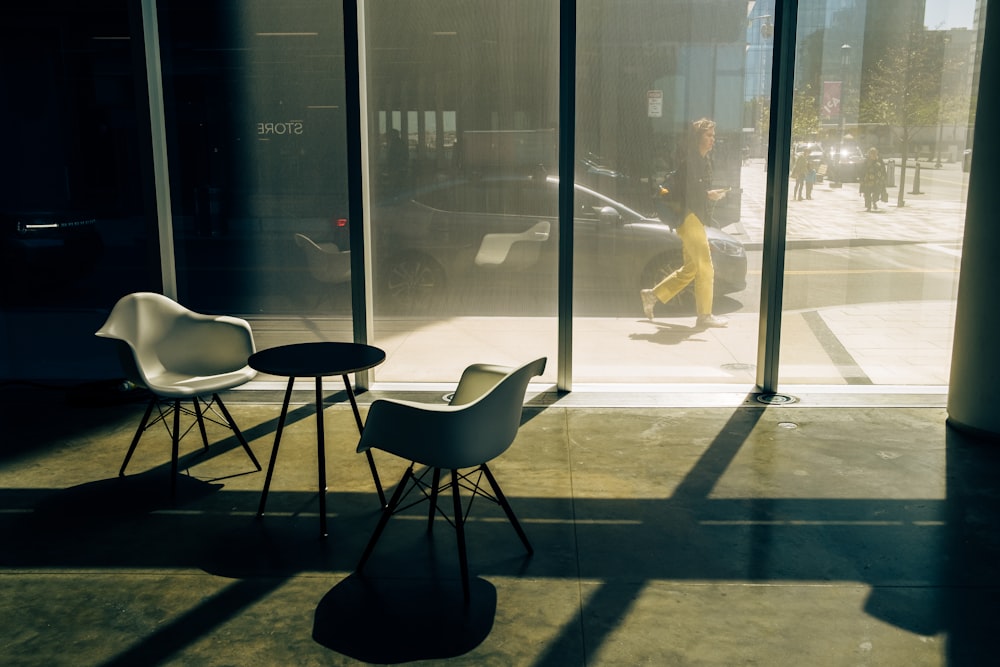 a table and chairs outside a building