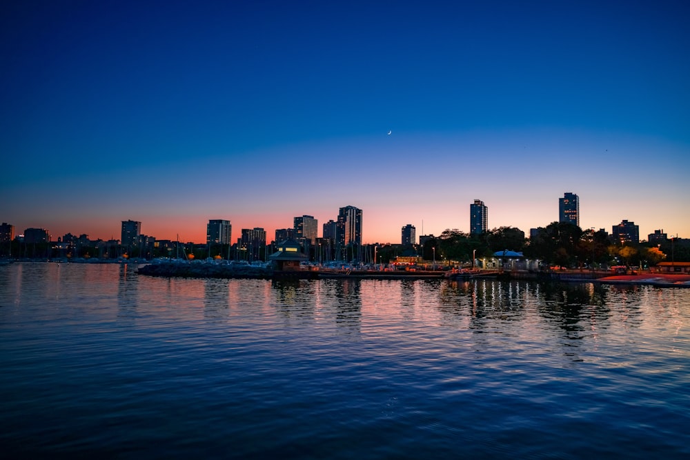 a city skyline at sunset