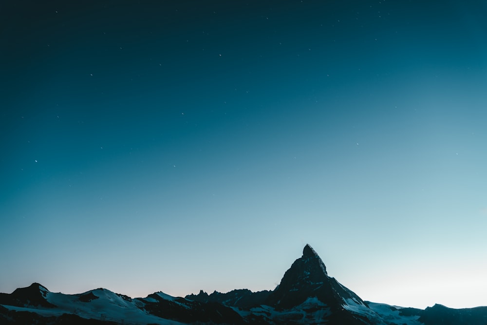 a mountain with snow