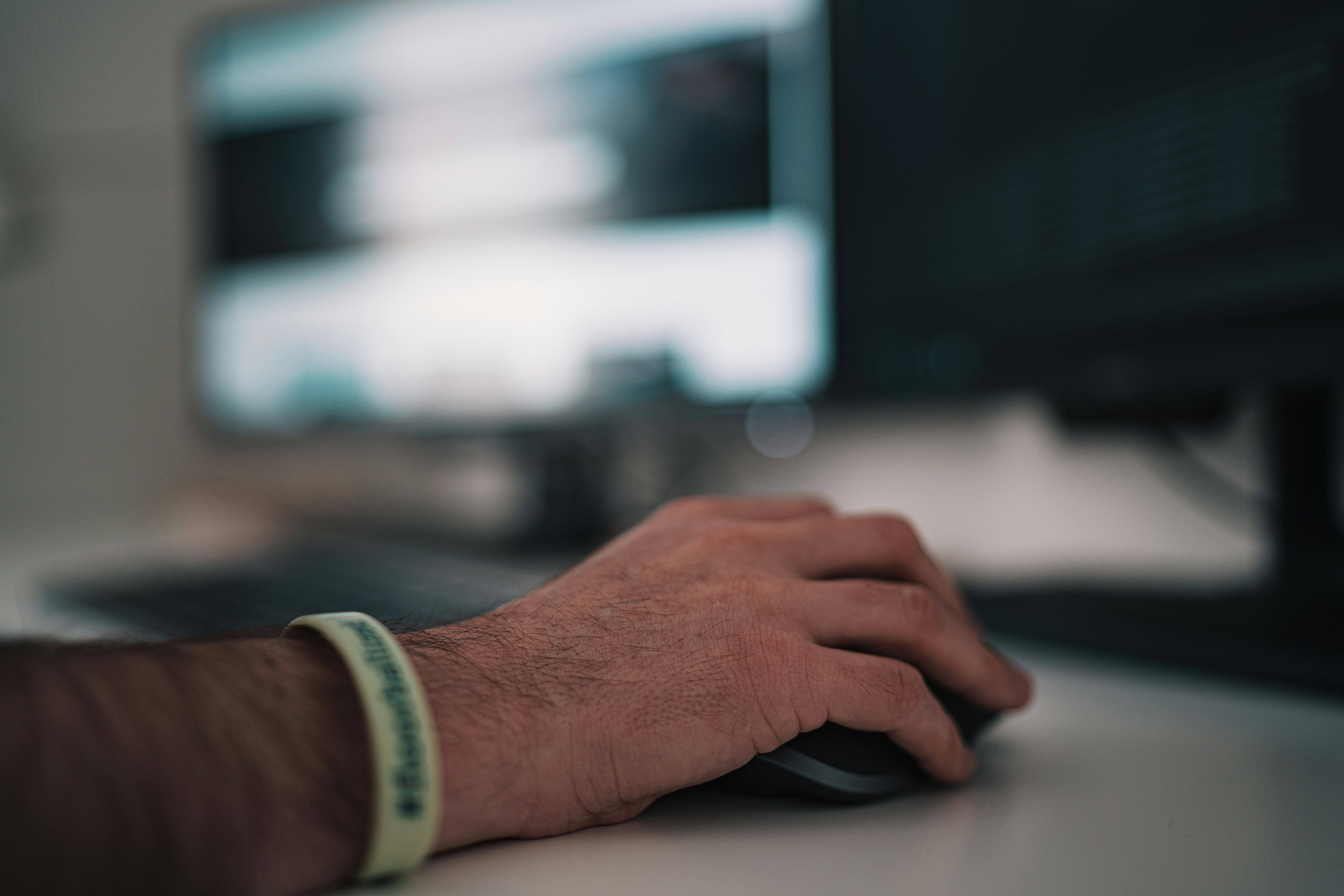 a person using a computer mouse
