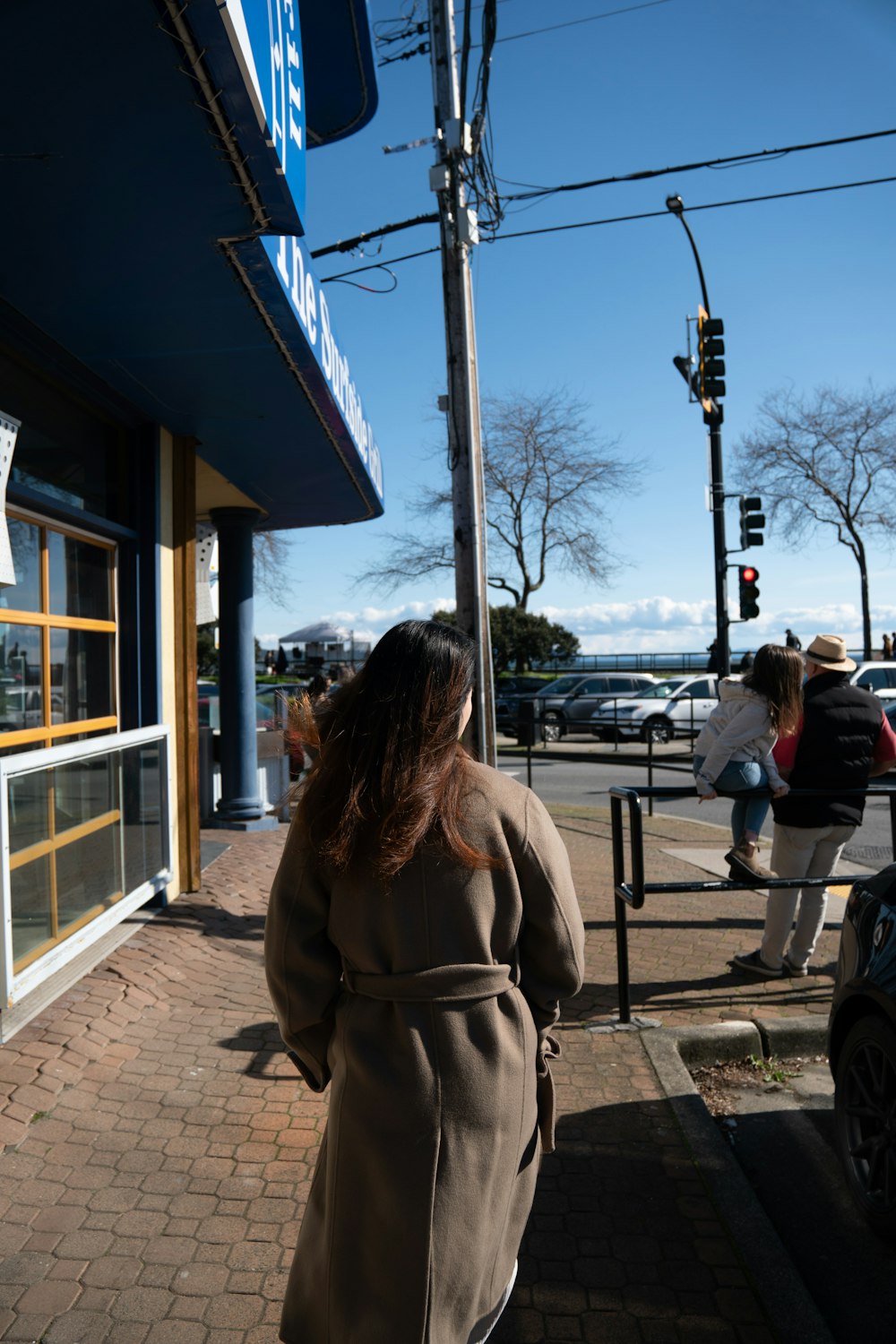 a person standing on a sidewalk