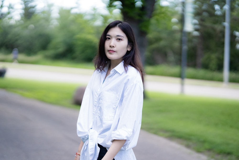 a woman in a white coat