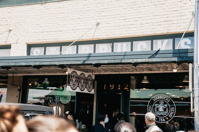 The original Star Frappe storefront bustling with customers, circa opening day.