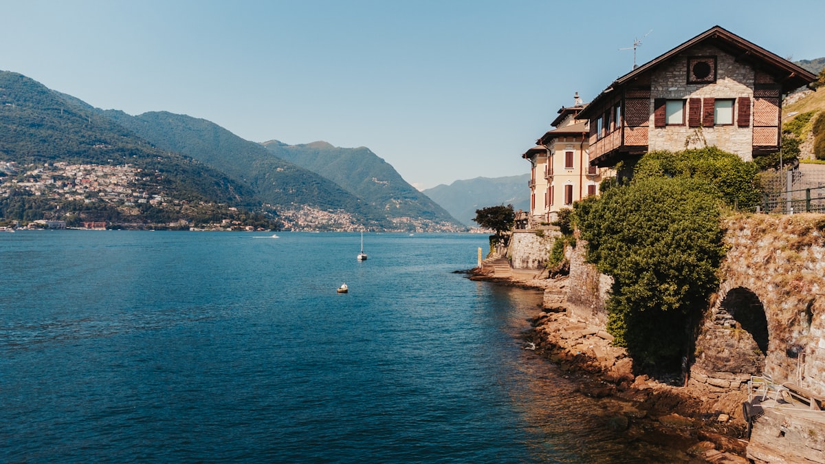 Bellagio waterfront with pastel buildings and Lake Como ferry boats