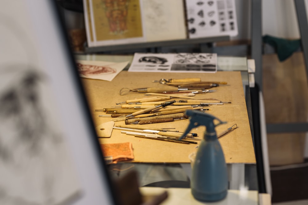 a desk with a variety of objects on it