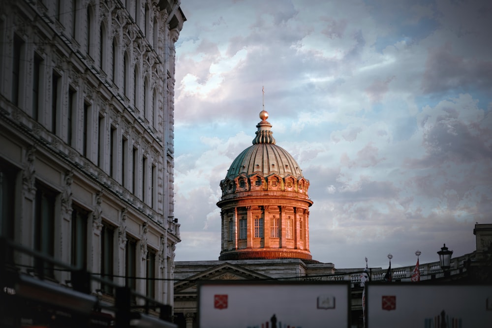 a domed building with a gold dome