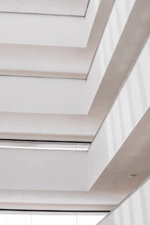 a white ceiling with white walls