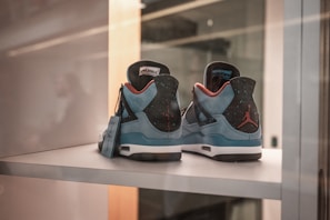 A close-up of a pair of classic Air Jordans on display at a sneaker store