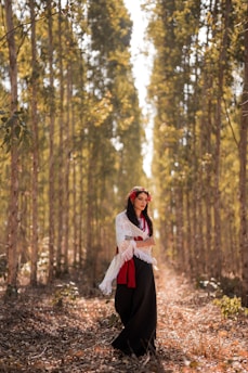 a person standing in a forest