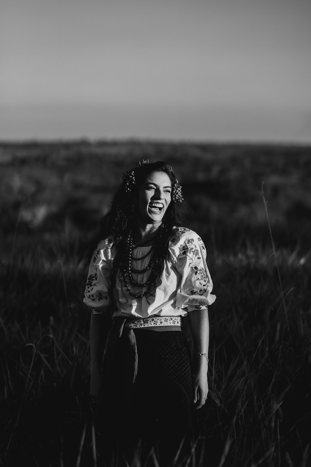 a person with tattoos in a field