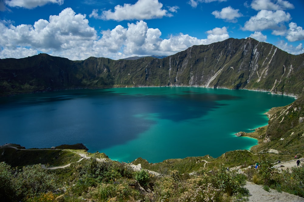 a lake surrounded by mountains