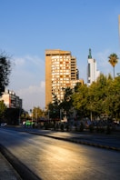 a large building with trees in front of it