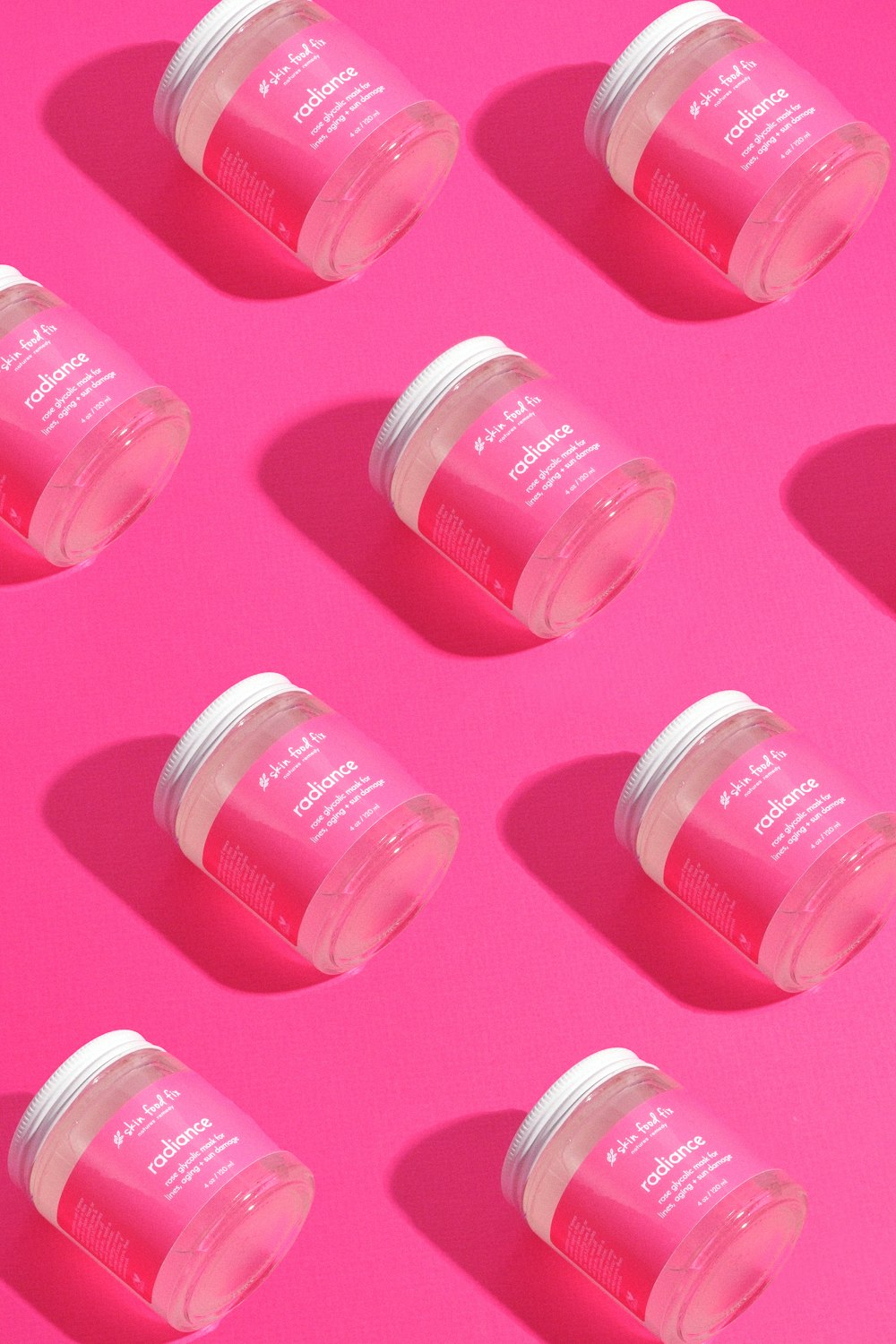 a group of pink bottles