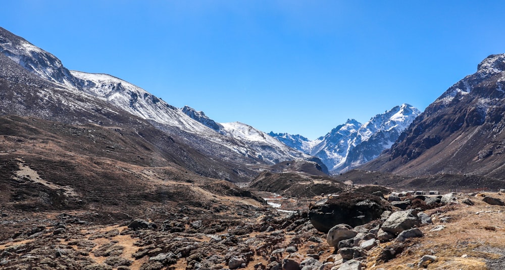 a rocky and snowy mountain range