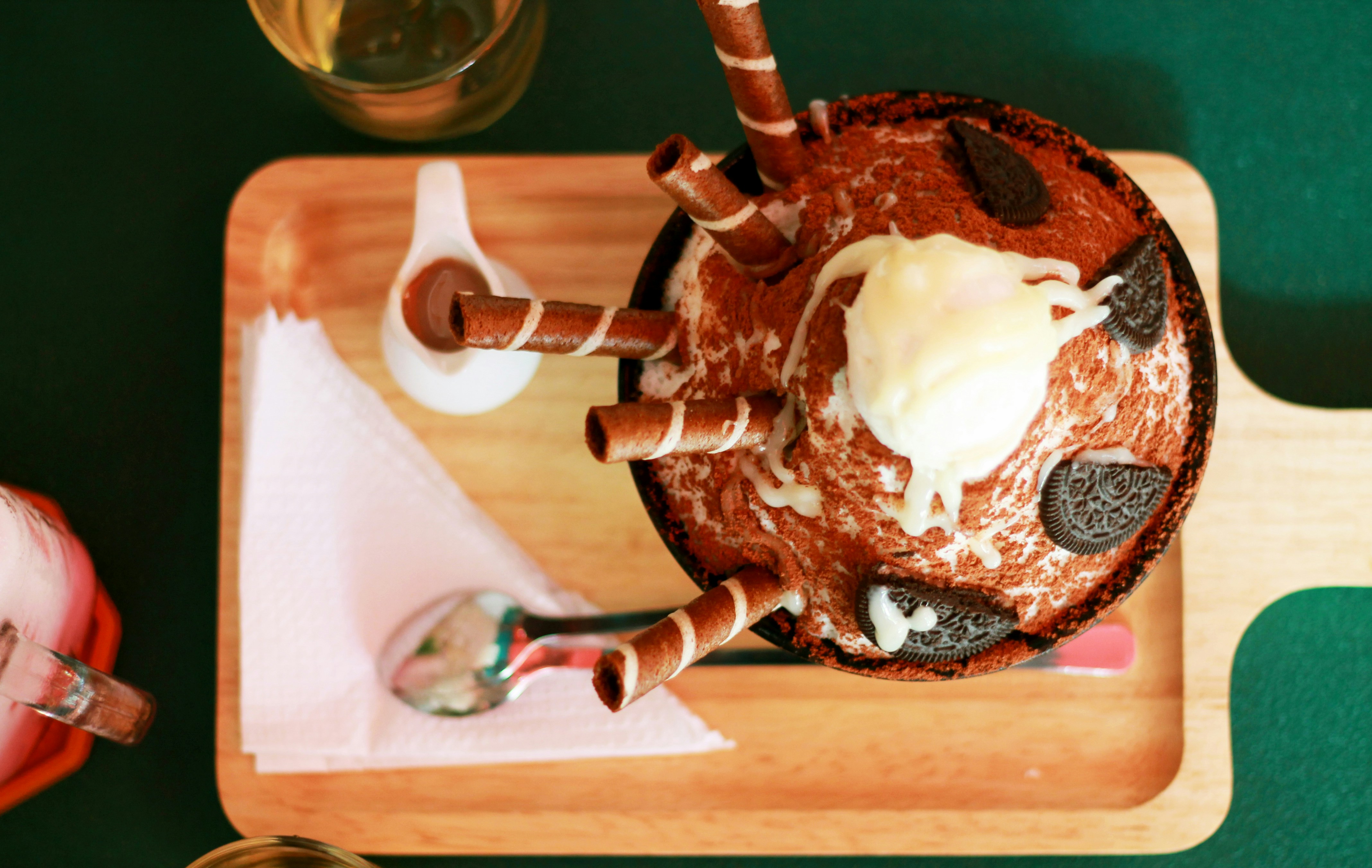 a skull with a knife and a skull on a cutting board