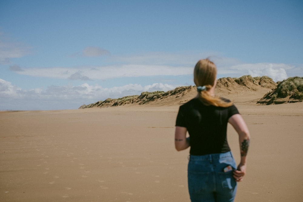 a person walking on a beach