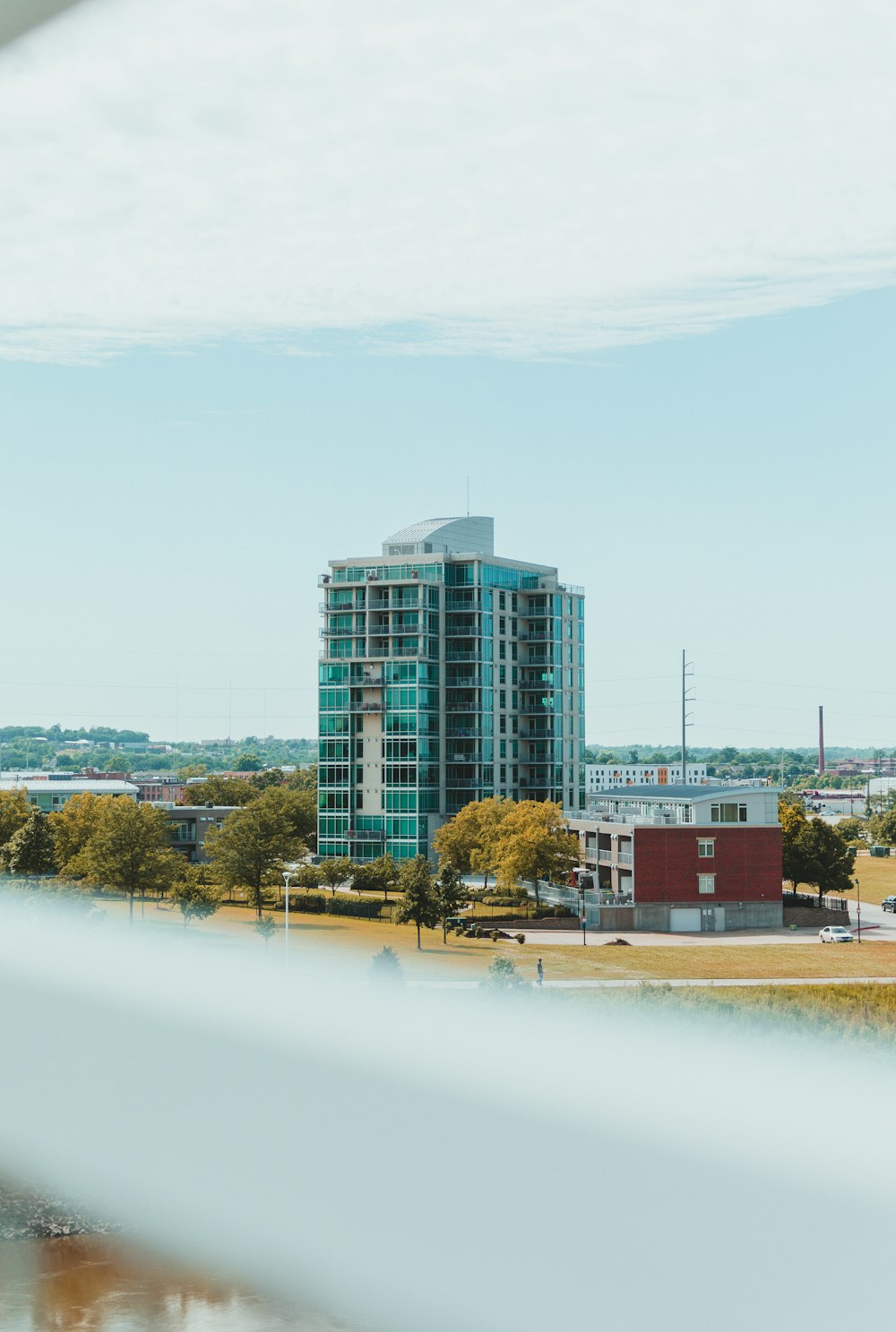 a building next to a body of water