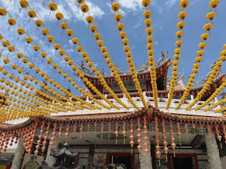 A peaceful temple in Singkawang decorated with lanterns during a cultural celebration.