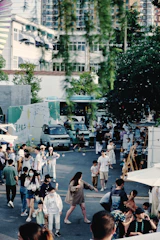 Lively Long Beach food festival scene with diverse food trucks and a buzzing crowd enjoying samples.