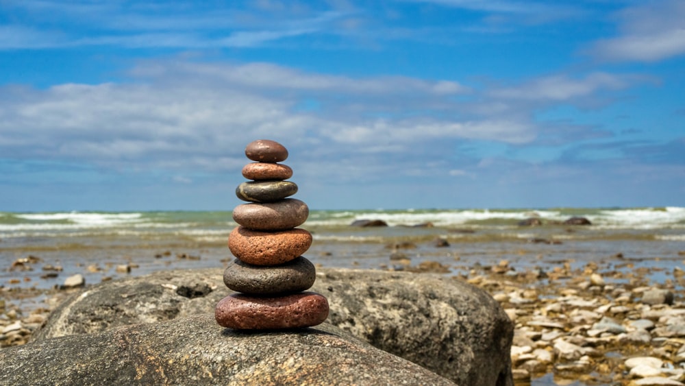 a stack of rocks on a beach