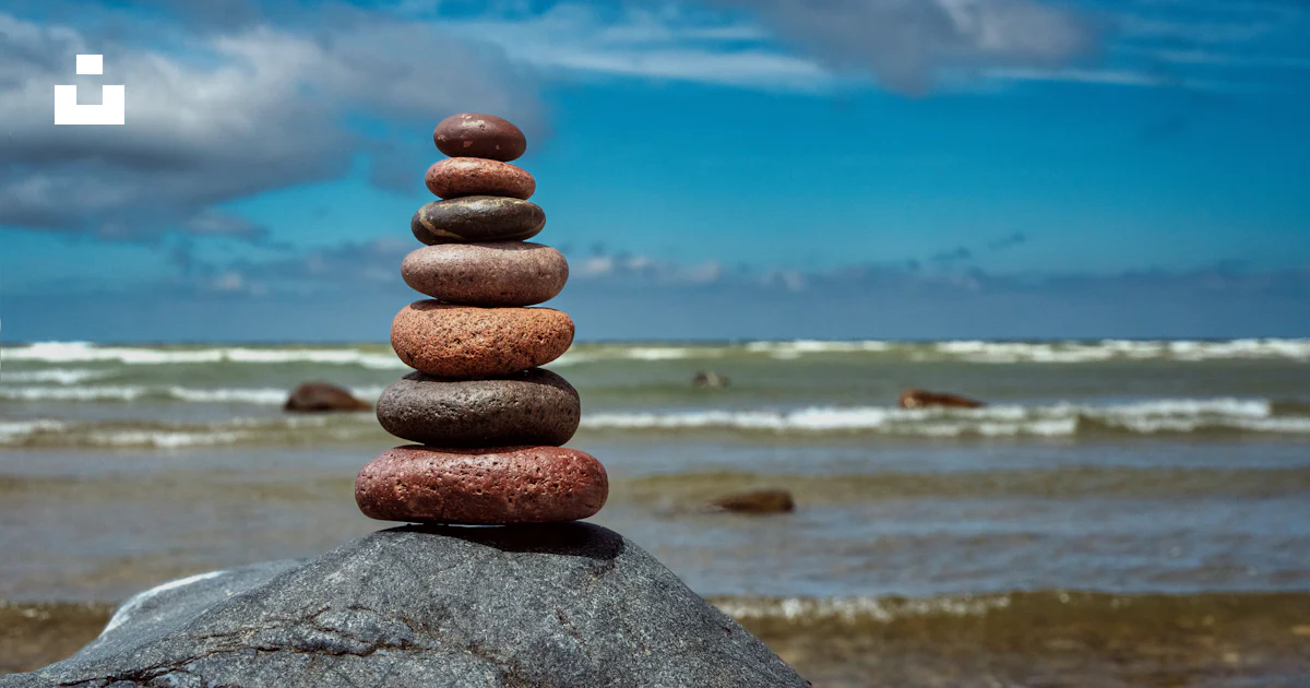 Blue Beach Rocks Stacked A stack of rocks on a beach photo – Free Blue Image on Unsplash
