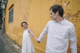 A happy couple exploring a vibrant Brazilian city street