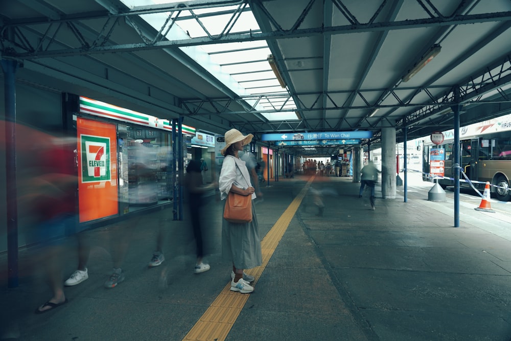 a person standing at a train station