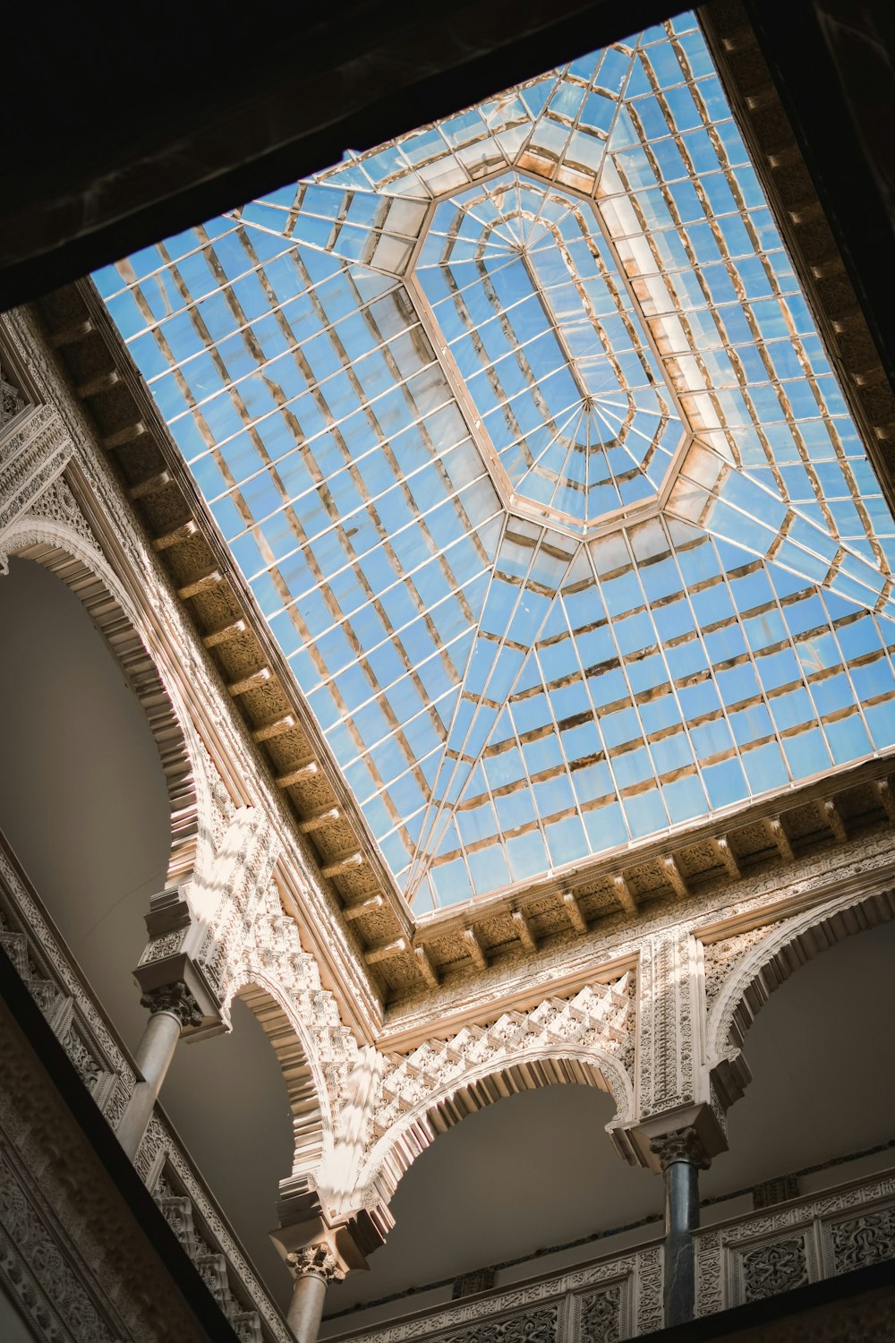 a tall building with a glass roof