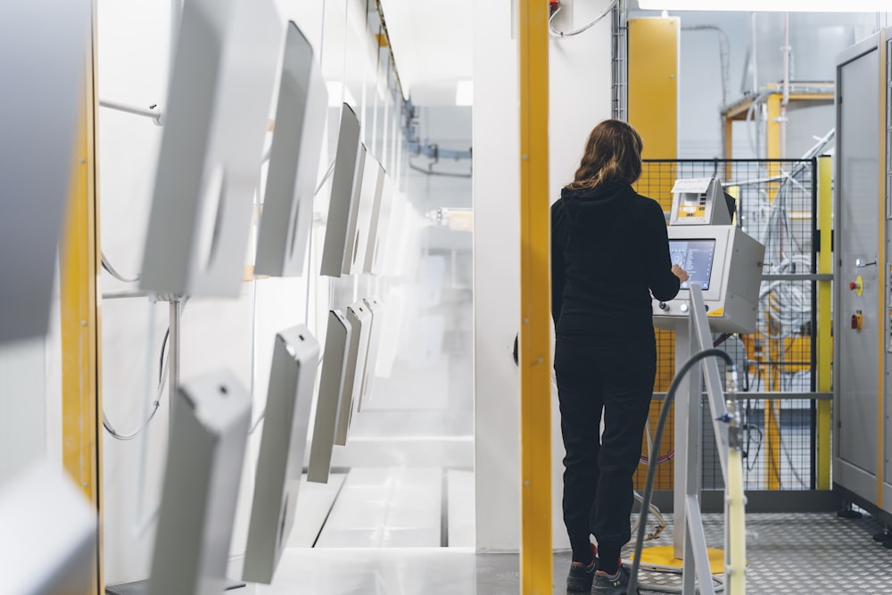 a person standing in a server room