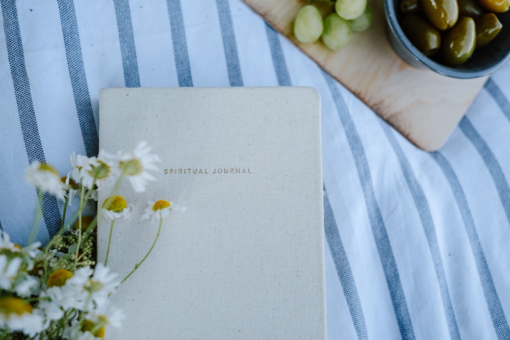 a white sheet with flowers on it