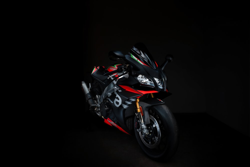 a red motorcycle with a black background