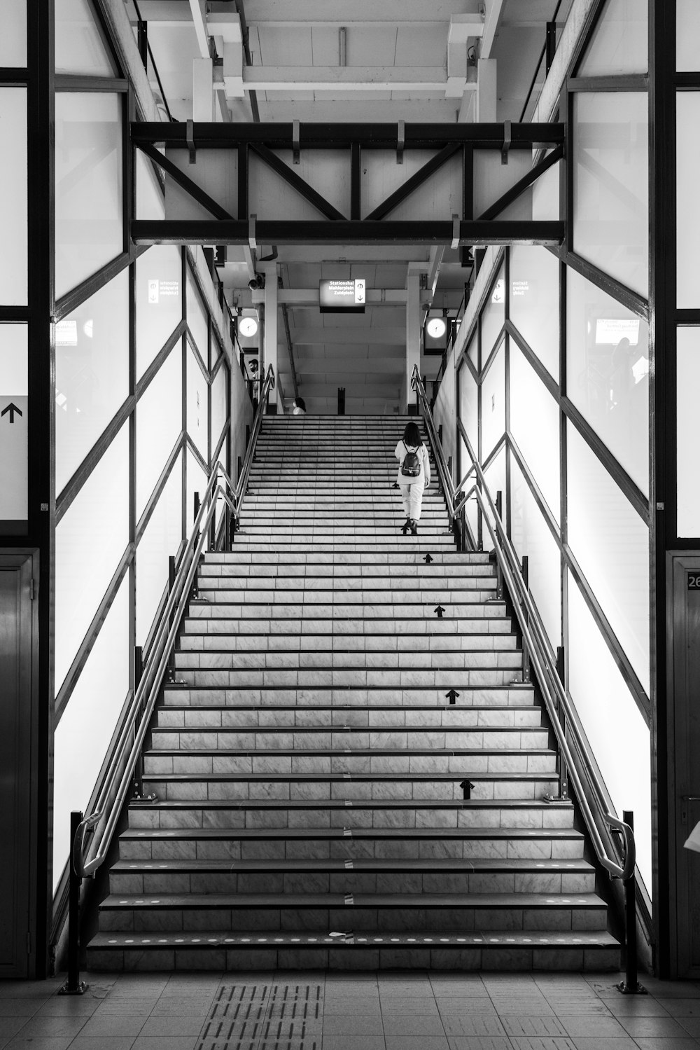 a person standing on a staircase