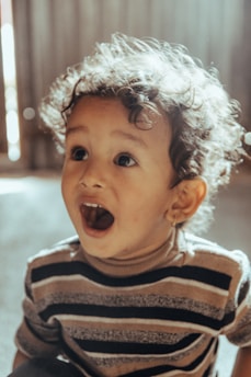 a child with curly hair