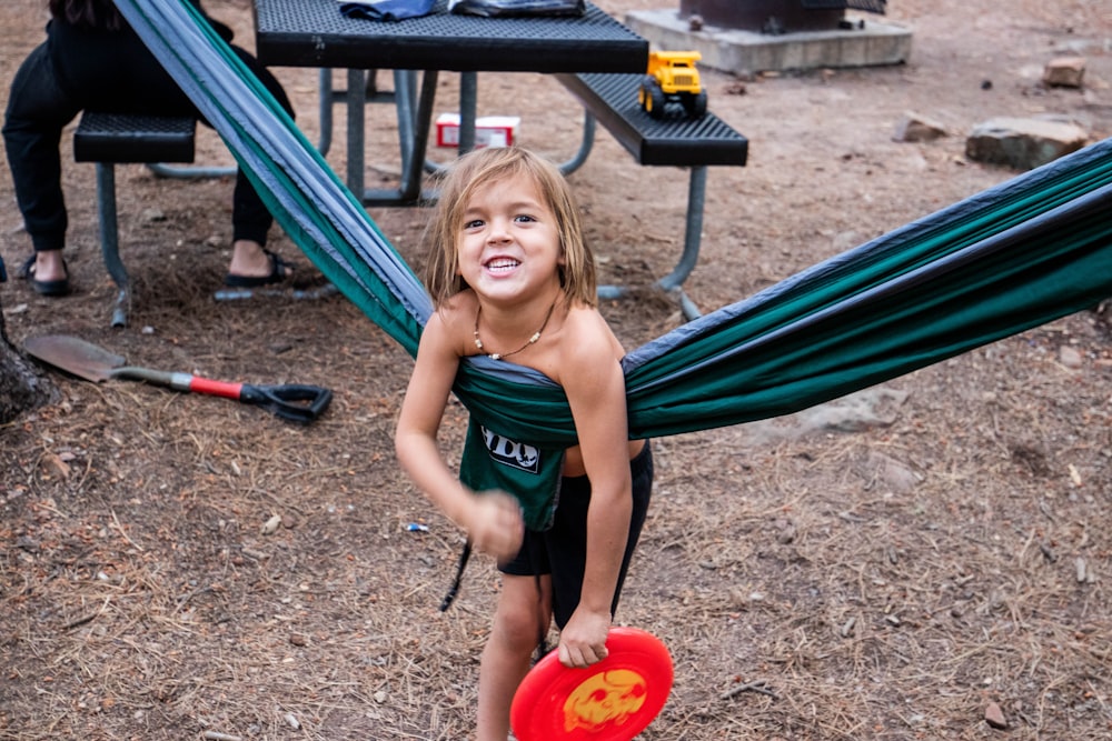 a girl playing in the sand