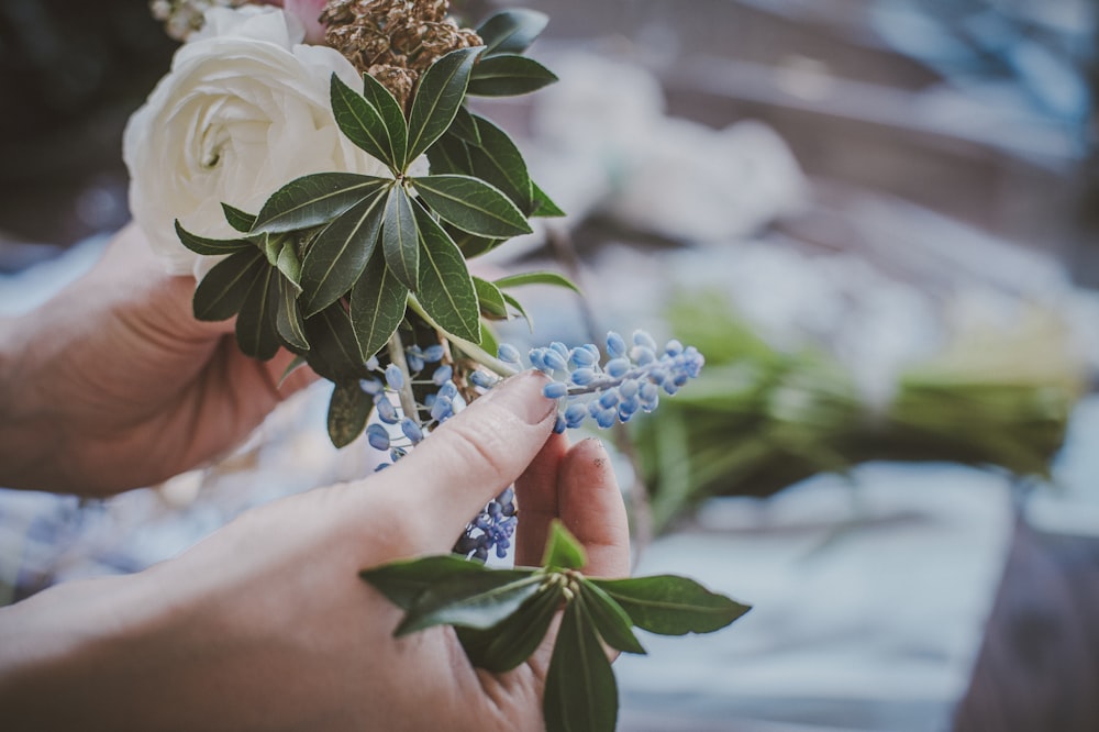 a person holding flowers