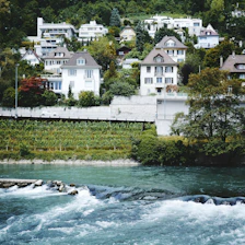 a river with houses along it