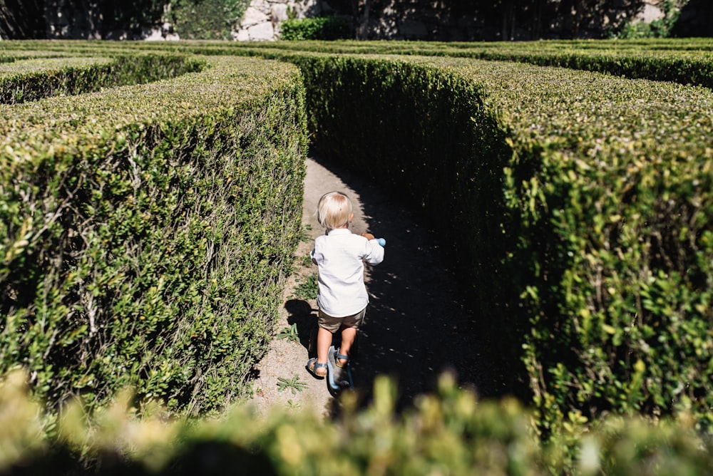 a child standing in a tunnel