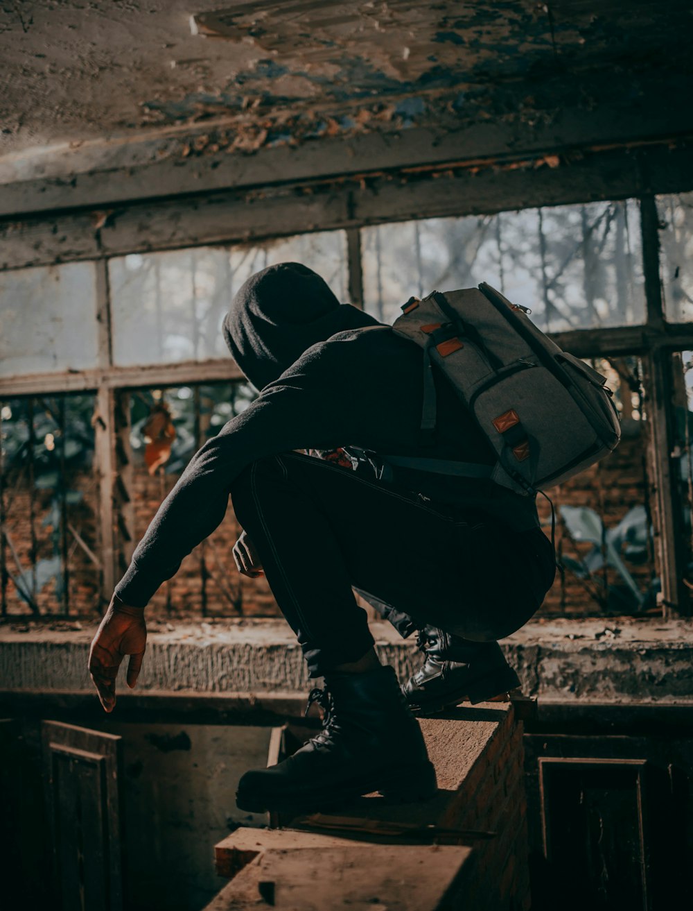 a man carrying a suitcase