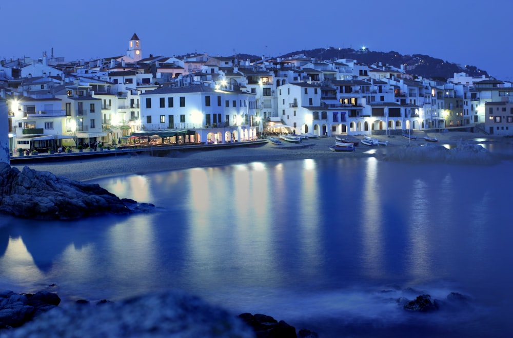 a body of water with buildings along it