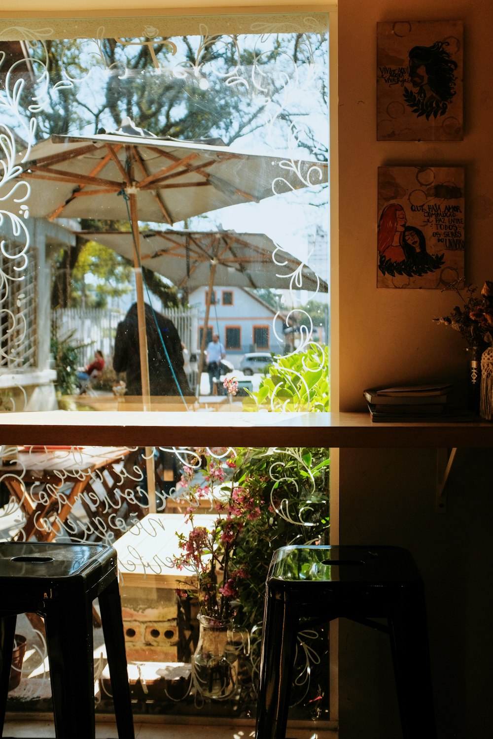 a window with a view of a city and a street