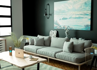 a living room with a large painting